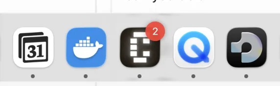 the conductor dock icon with a red badge showing two finished agents